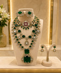Luxury Emerald Green CZ bridal jewellery set with matching earrings, premium green stones, sparkling cubic zirconia, and elegant gold finish for weddings and special occasions.